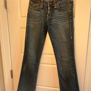Dark wash True Religion bootcut jeans with gold accents